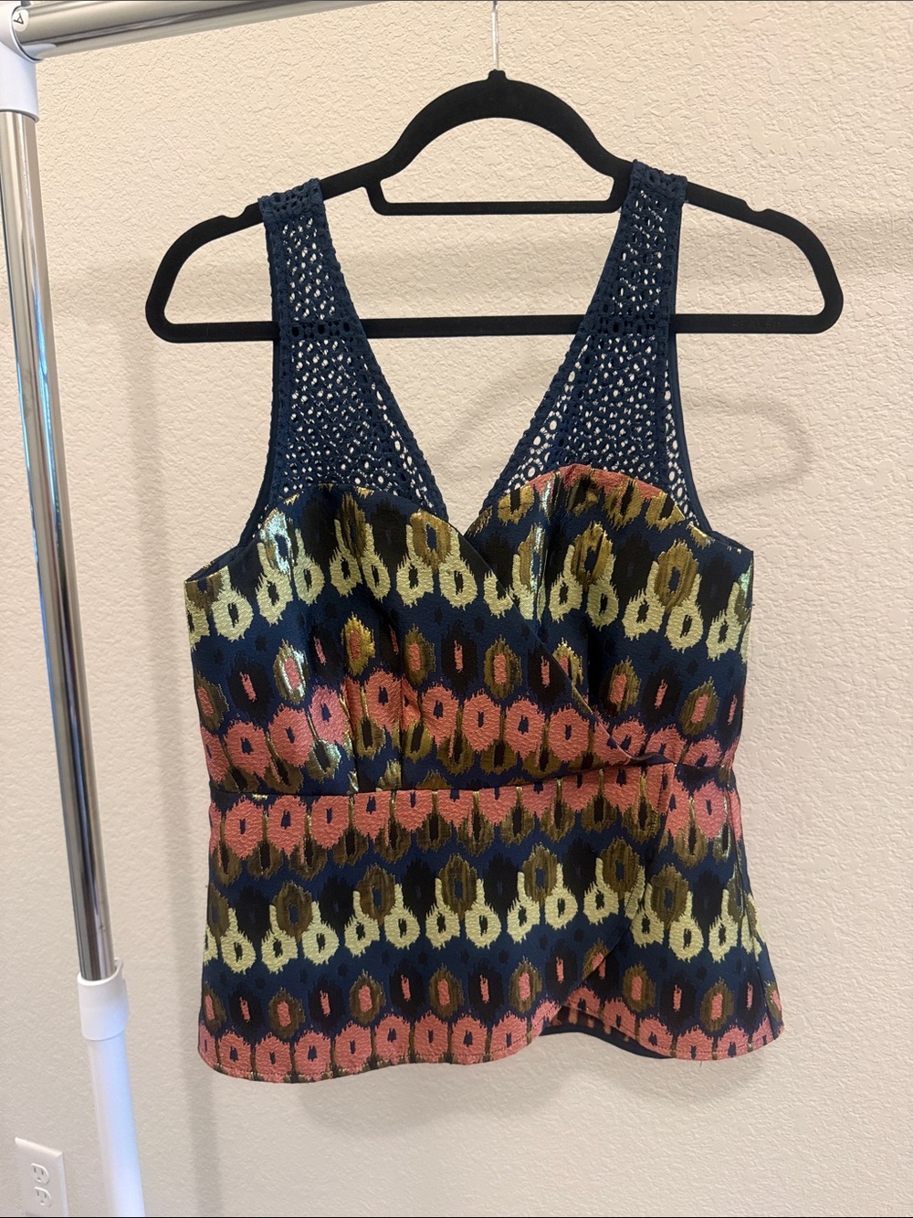 Sleeveless Navy Crochet-Back Printed Peplum Top